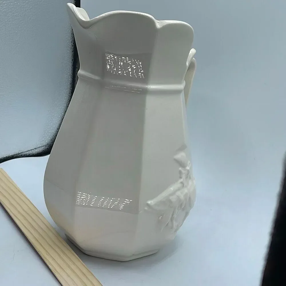 Vintage embossed ceramic country goose pitcher .